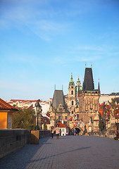 Image showing Charles bridge early in the morning with tourists