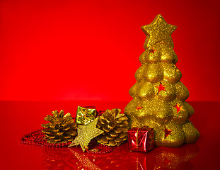 Image showing Golden evergreen with Christmas decorations