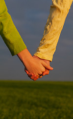 Image showing Teen girls holding hands