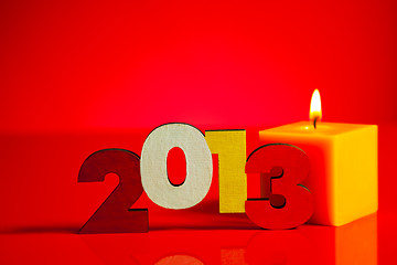 Image showing Wooden 2013 year number with a burning candle