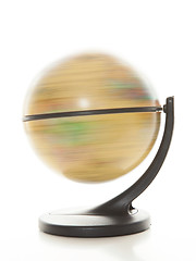 Image showing Spinning globe against white background