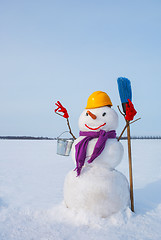 Image showing Lonely snowman at a snowy field