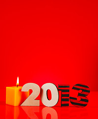 Image showing Wooden 2013 year number with a burning candle