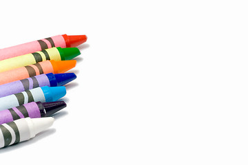 Image showing Colorful crayons on a white background with text space