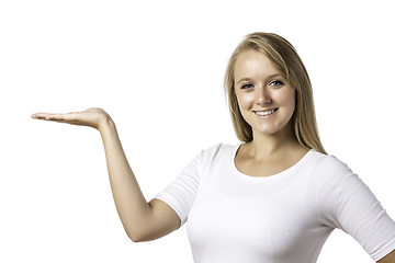 Image showing Laughing blond woman holding the palm of the right hand up