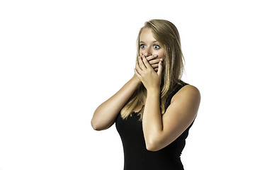 Image showing Shocked young girl in black shirt