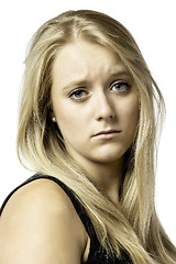Image showing Portrait of a sad blond girl with blue eyes