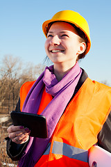 Image showing Young lady architect staying outdoors