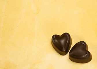 Image showing Two heart shaped chocolate candies