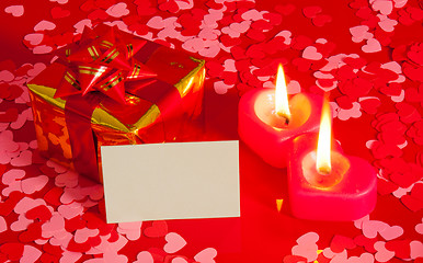 Image showing Present and two heart shaped candles with blank card