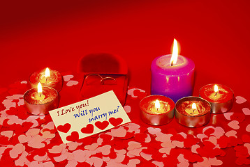 Image showing Two rings and a card with marriage proposal with six candles