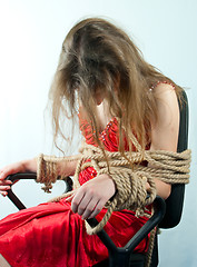 Image showing Woman tied up with a rope