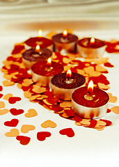 Image showing Burning candles heart shaped