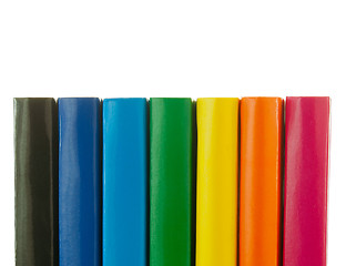 Image showing Row of colorful books' spines