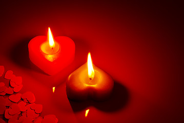 Image showing Two burning heart shaped candle