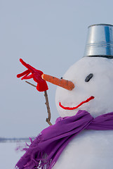 Image showing Lonely snowman at a snowy field