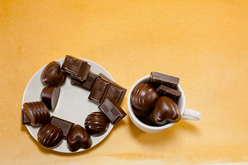 Image showing Cup full with chocolate candies