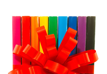 Image showing Row of colorful books' spines