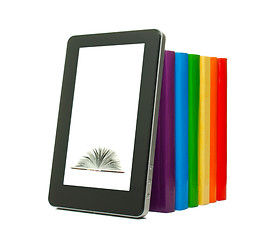 Image showing Row of colorful books and tablet PC