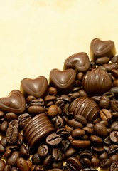 Image showing Heart shaped chocolate candies and coffee beans