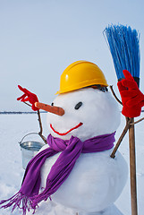 Image showing Lonely snowman at a snowy field