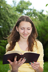Image showing Teen girl reading book