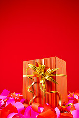 Image showing Present in a red box against red background