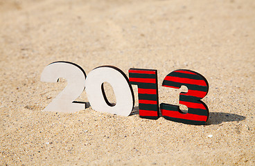 Image showing Wooden 2013 year number on the sand