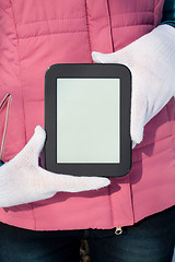 Image showing Woman's hands holding e-book reader