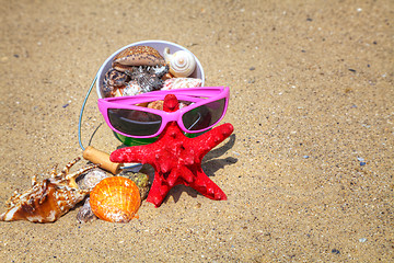 Image showing Starfish and shells on the sand