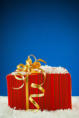 Image showing Christmas present against blue background