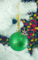 Image showing Green ball hanging on the Christmas tree