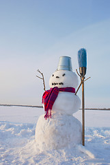 Image showing Lonely snowman at a snowy field