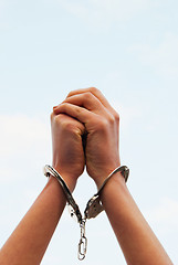 Image showing Hands handcuffed