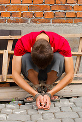 Image showing Man tied up with rope