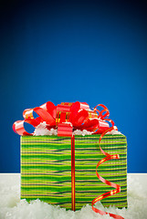 Image showing Christmas present against blue background