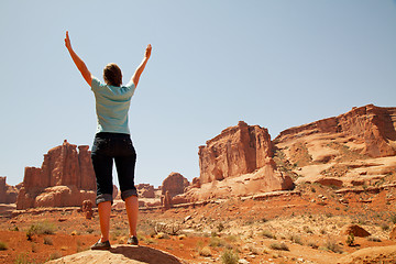 Image showing Woman with raised hands