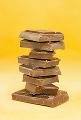 Image showing Chocolate stacked into bar