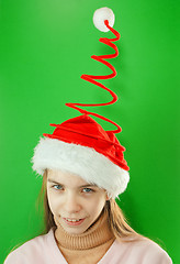 Image showing Pretty Santa girl, closeup portrait of a teen girl wearing Chris