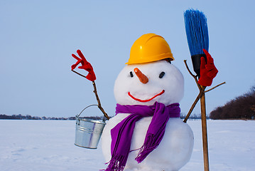 Image showing Lonely snowman at a snowy field