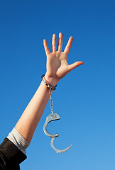 Image showing Handcuffed woman's hand