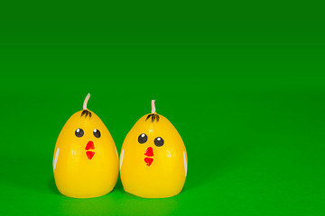 Image showing Two yellow chicken candles