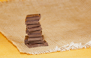 Image showing Chocolate stacked into bar