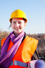 Image showing Young lady architect staying outdoors