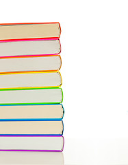 Image showing Stacks of colorful books - library concept
