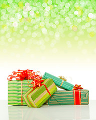 Image showing Christmas presents against bokeh background