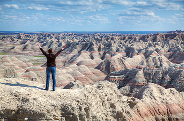 Image showing Woman with raised hands