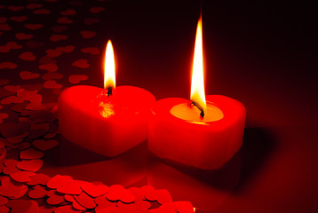 Image showing Two burning heart shaped candles