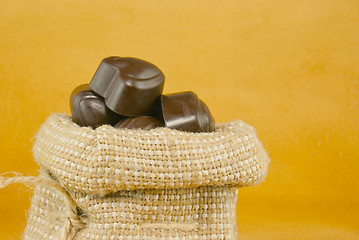 Image showing Close up of the sack full of chocolate candies