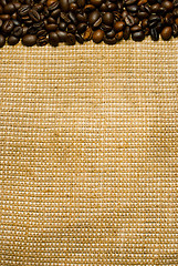 Image showing Background of the roasted coffee beans and burlap